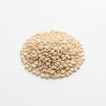 Ivory white split skinned urad dal on a white background